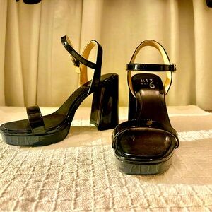 Sabria Sandal, High Chunky Platform Heel (black patent leatherette shoe size 7)